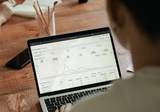 A woman viewing sales data and insights extracted from RingCentral Analytics