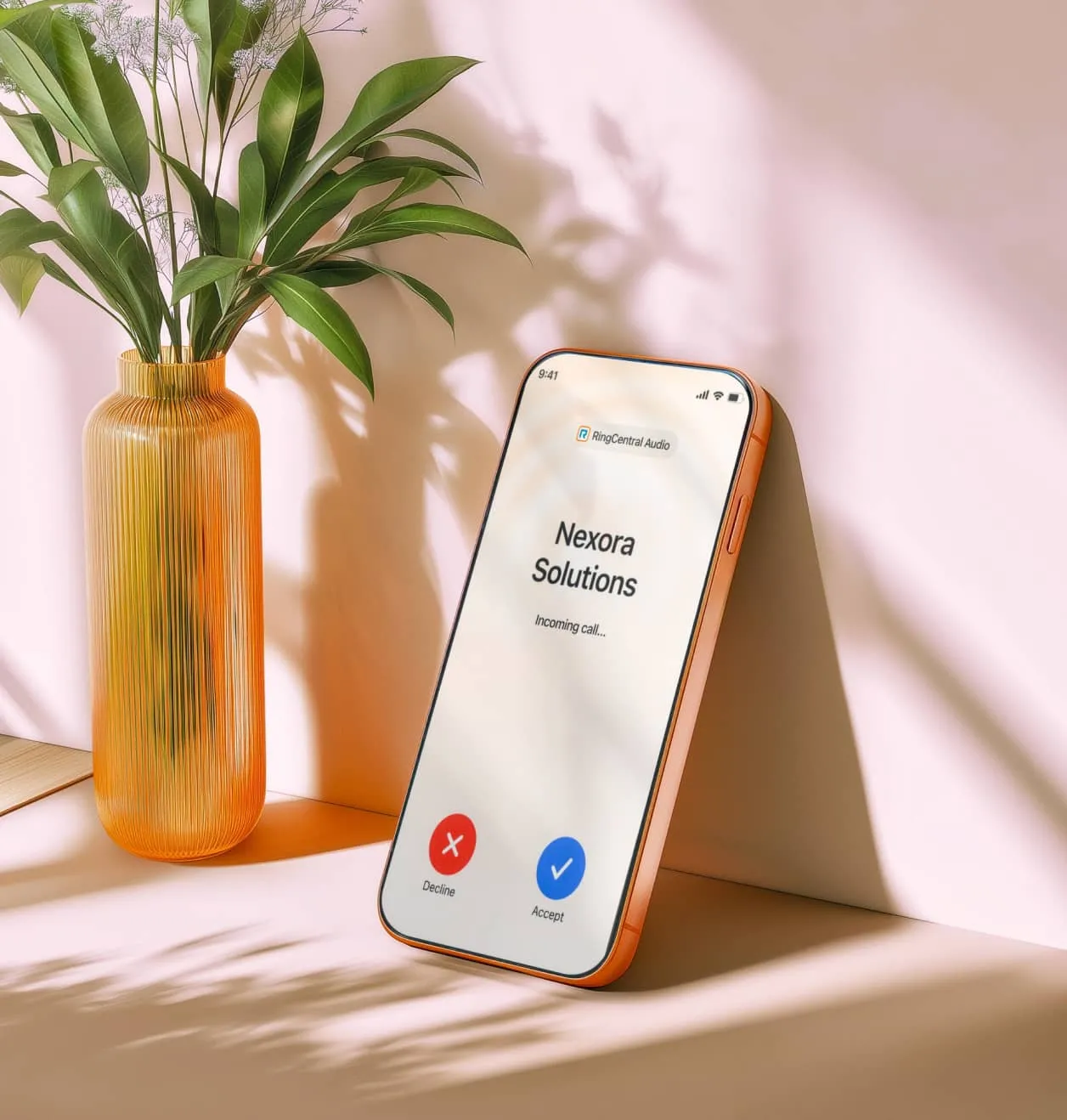 A smartphone displaying an incoming call, showing the business name on the RingCentral App.
