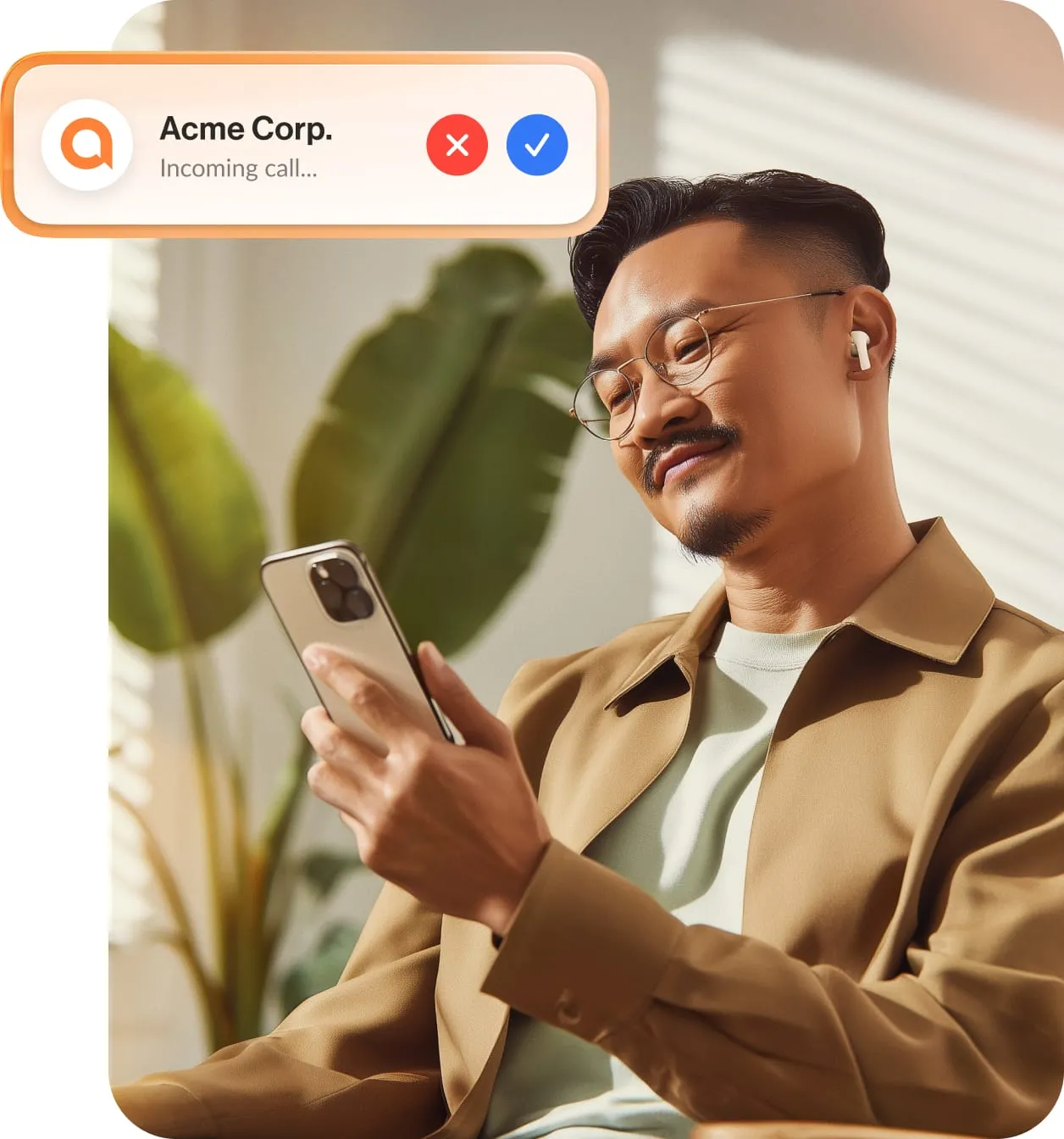 A male engage in a call between coworkers using the RingCentral app on his mobile phone
