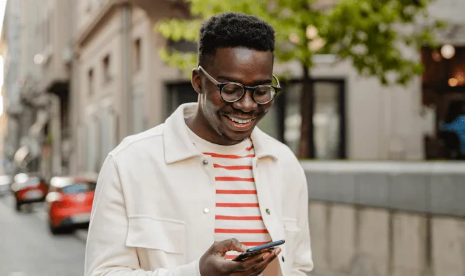 A man reading the RingEX Service Privacy datasheet on his mobile phone